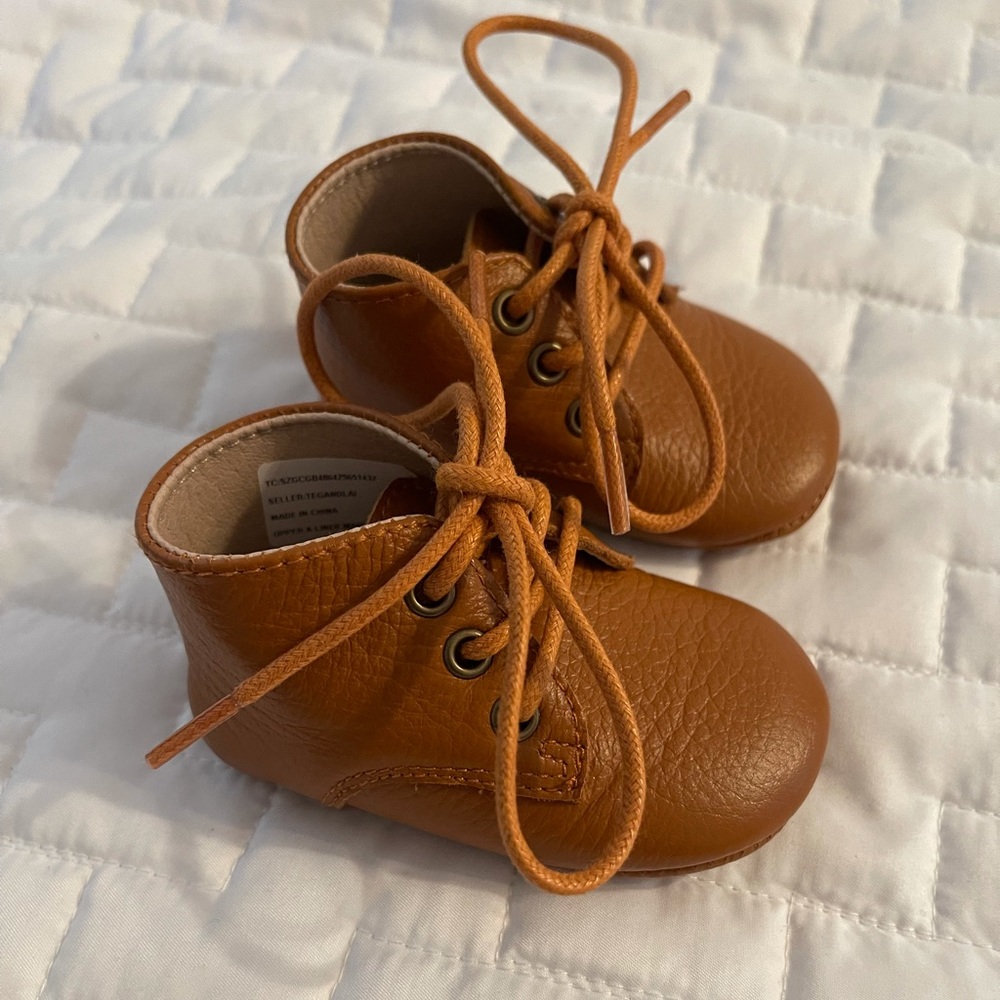 Teg+lai booties.  Size 2. Brown. NWT.
